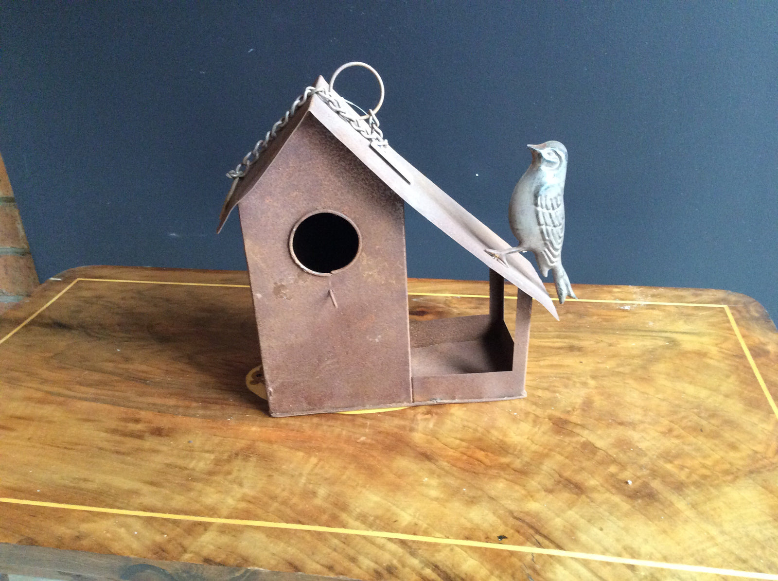  Rust Hanging Birdhouse with bird on sloping roof