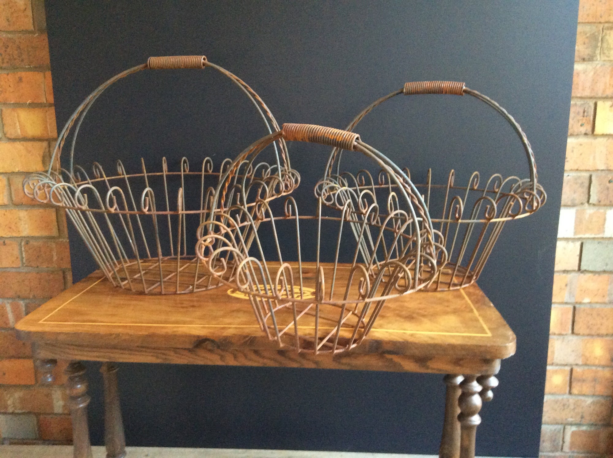   Set of Three -Handled Rust baskets